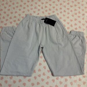 Brandy Melville John Galt blue sweatpants 
New with tag! Fits size Xsmall/small